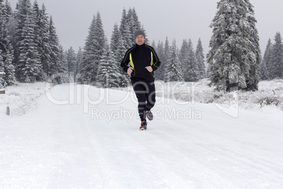 man in winter jogging