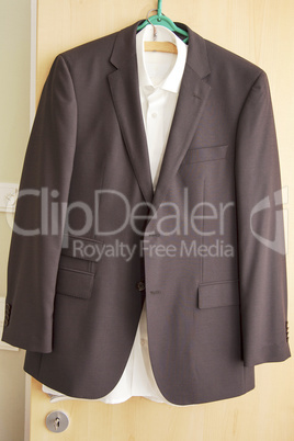 suit and shirt on hanger