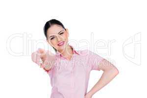 happy young woman pointing at the camera