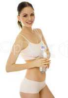 athletic young woman drinking bottled water