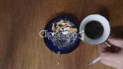 Cigarette and cup of coffee
