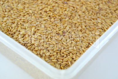 Golden flax seeds on a table