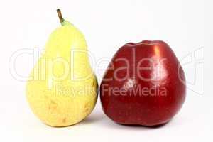 ripe fresh yellow pear and red apple