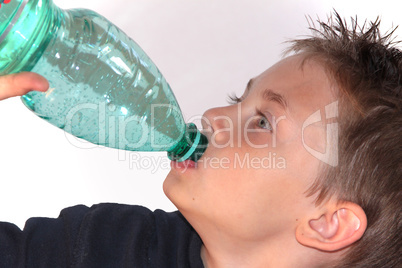Child drinks water from bottle