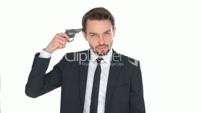 Suicidal businessman holding a gun to his head