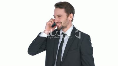 Happy stylish businessman chatting on his mobile