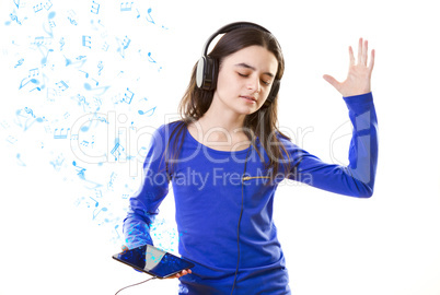 smiling girl listening to music on digital tablet pc
