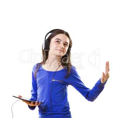 smiling girl listening to music on digital tablet pc