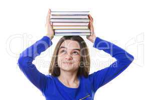 young girl with stack of books on her head