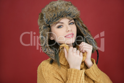 beautiful happy young woman in winter fashion