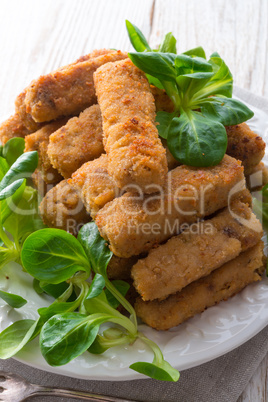 home-baked fish sticks with salad