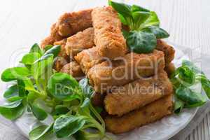 home-baked fish sticks with salad