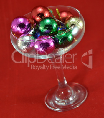 Glass of champagne with christmas balls
