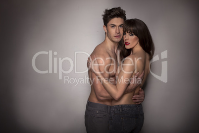 passionate sexy topless couple