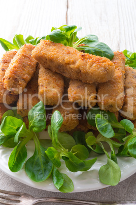 home-baked fish sticks with salad