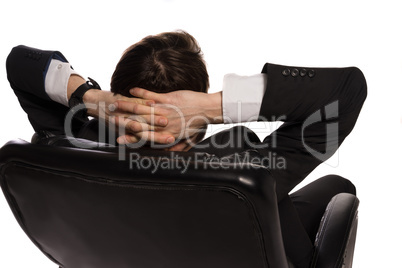 relaxed businessman sitting in a comfortable chair