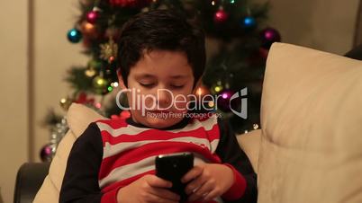 sweet child using and playing smartphone