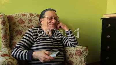 elderly woman watching television