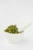 thyme in white mortar