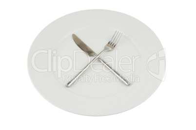 plate with knife and fork on white