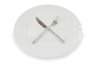 plate with knife and fork on white