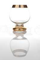 Antique cognac glass with reflection
