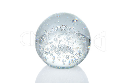 Crystal ball with bubbles and reflection isolated on white