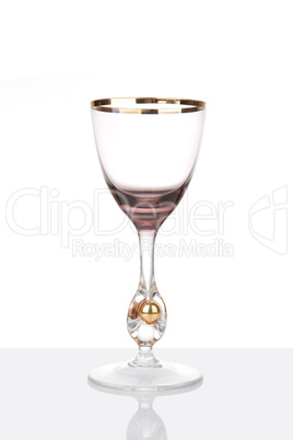 Rare antique wine glass with reflection, isolated on white