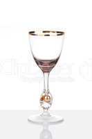 Rare antique wine glass with reflection, isolated on white
