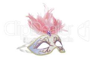 Beautiful carnival mask with pink feathers, isolated on white