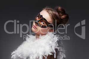 Girl in masquerade mask