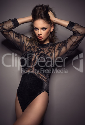 sultry beautiful woman in a leotard