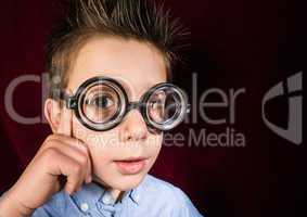 child with big glasses