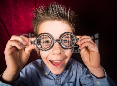 child with big glasses