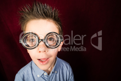 child with big glasses