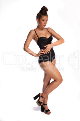 voluptuous woman in a swimsuit and heels
