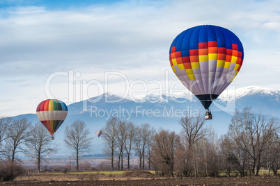 multicolored balloon in the blue sky