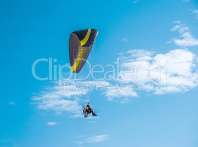 paragliding fly on blue sky