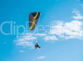 paragliding fly on blue sky
