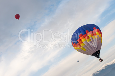 multicolored balloon in the blue sky