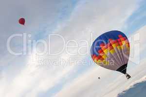 multicolored balloon in the blue sky