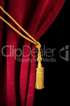 red velvet curtain with tassel