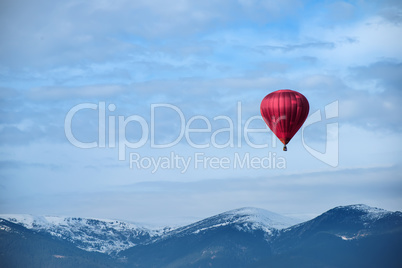 red balloon in the blue sky