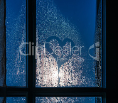 moonlight through the window. sweaty glass and heart