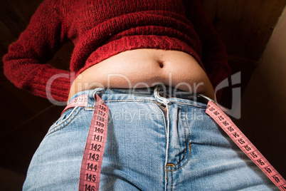 woman showing fat belly