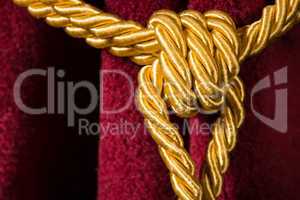 red velvet curtain with tassel