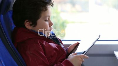 young boy with digital tablet