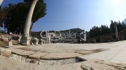 tourists visiting ruins amphitheater