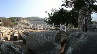 tourist visiting ruins ancient Ephesus