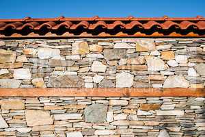 wall built of stones. sun light